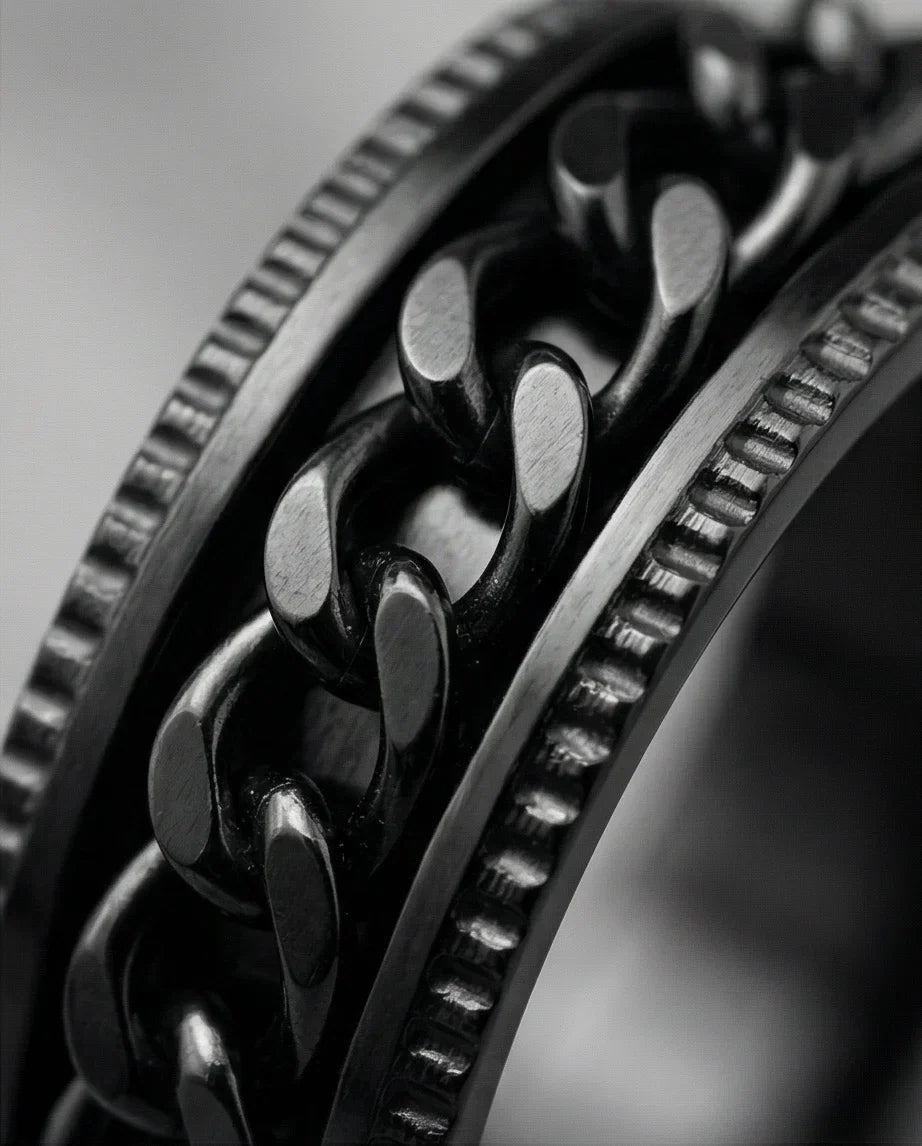 The Obsidian Kinetic: Industrial Chain Spinner Band