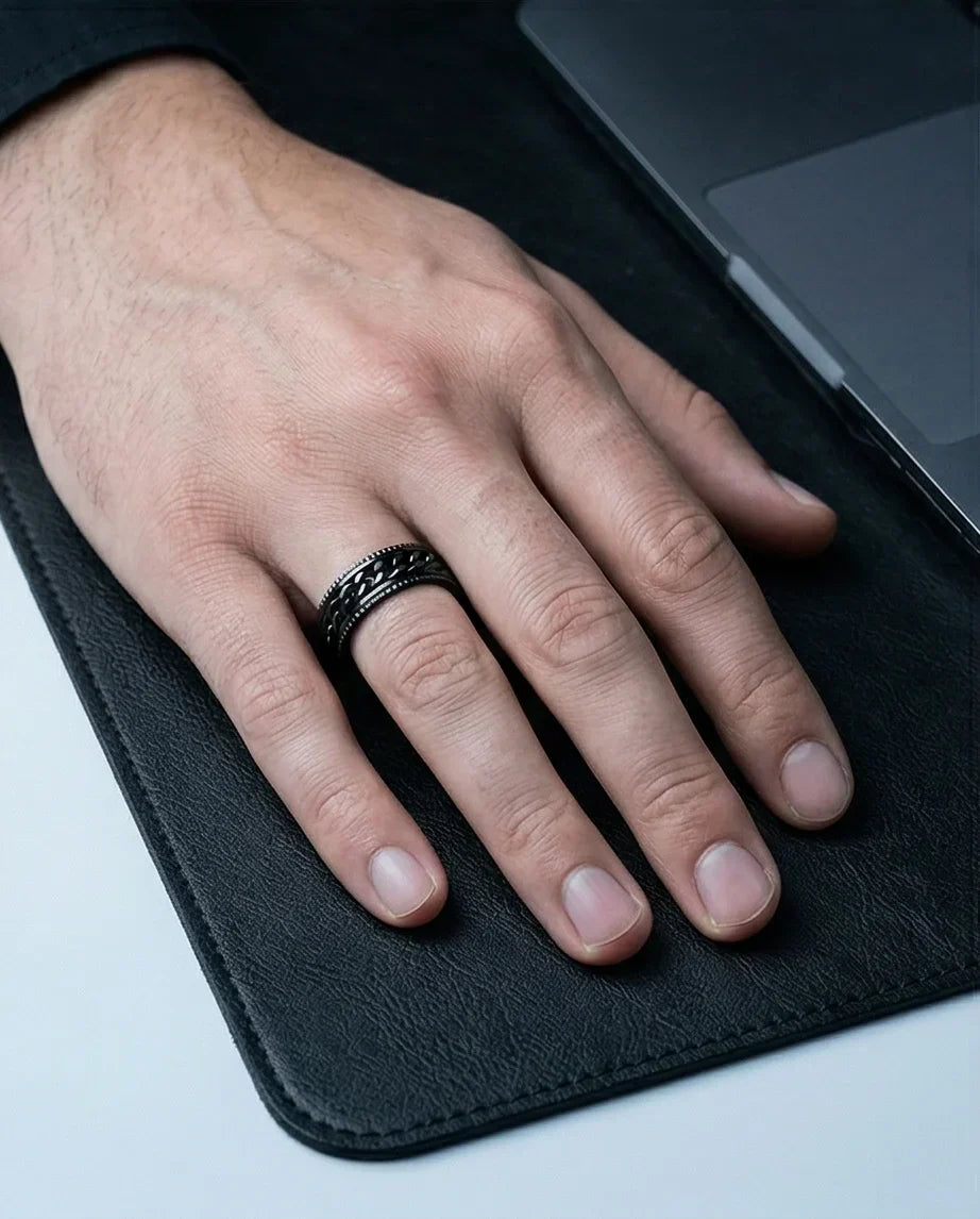 The Obsidian Kinetic: Industrial Chain Spinner Band