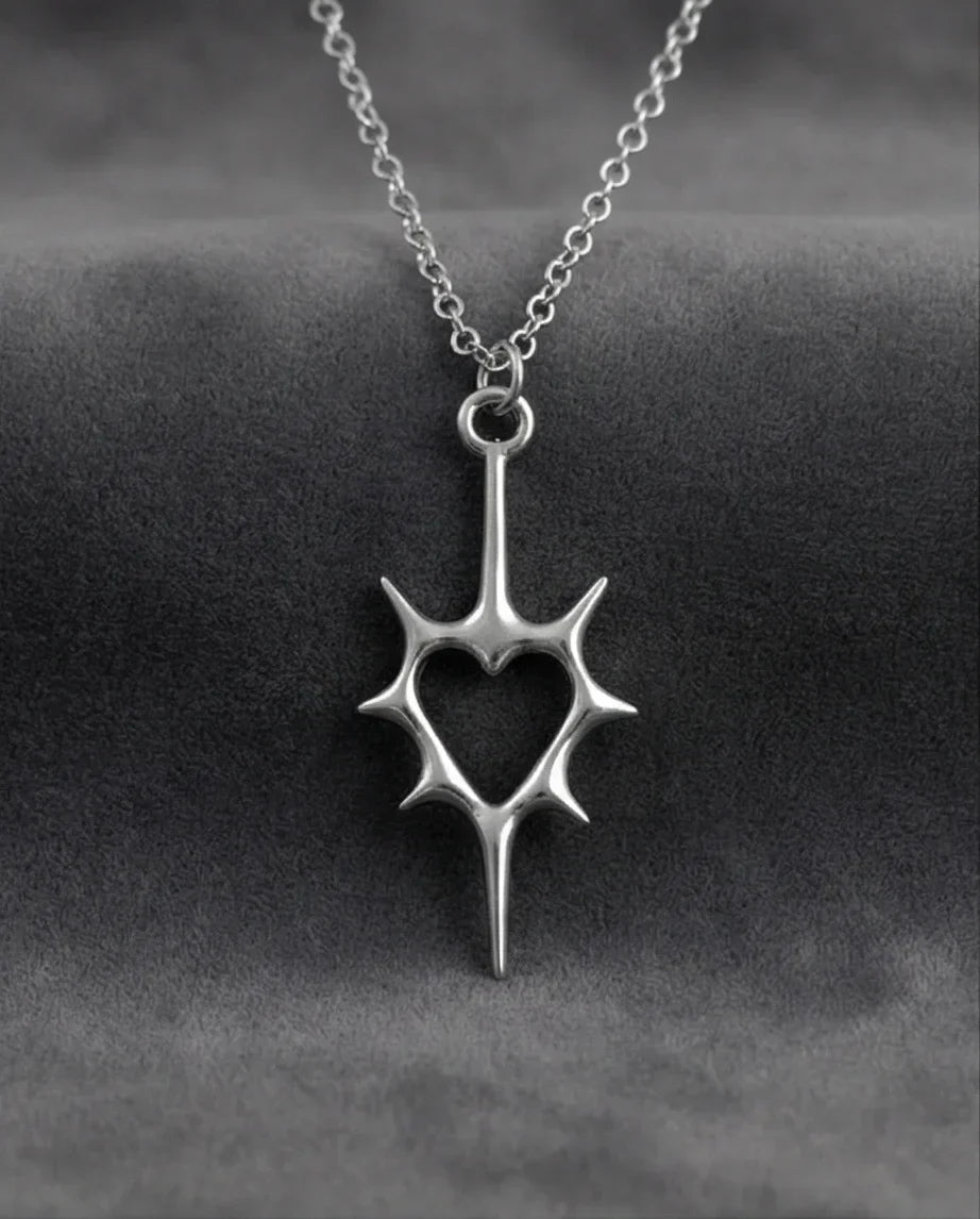 The Thorned Aura: Spiky Heart Statement Necklace