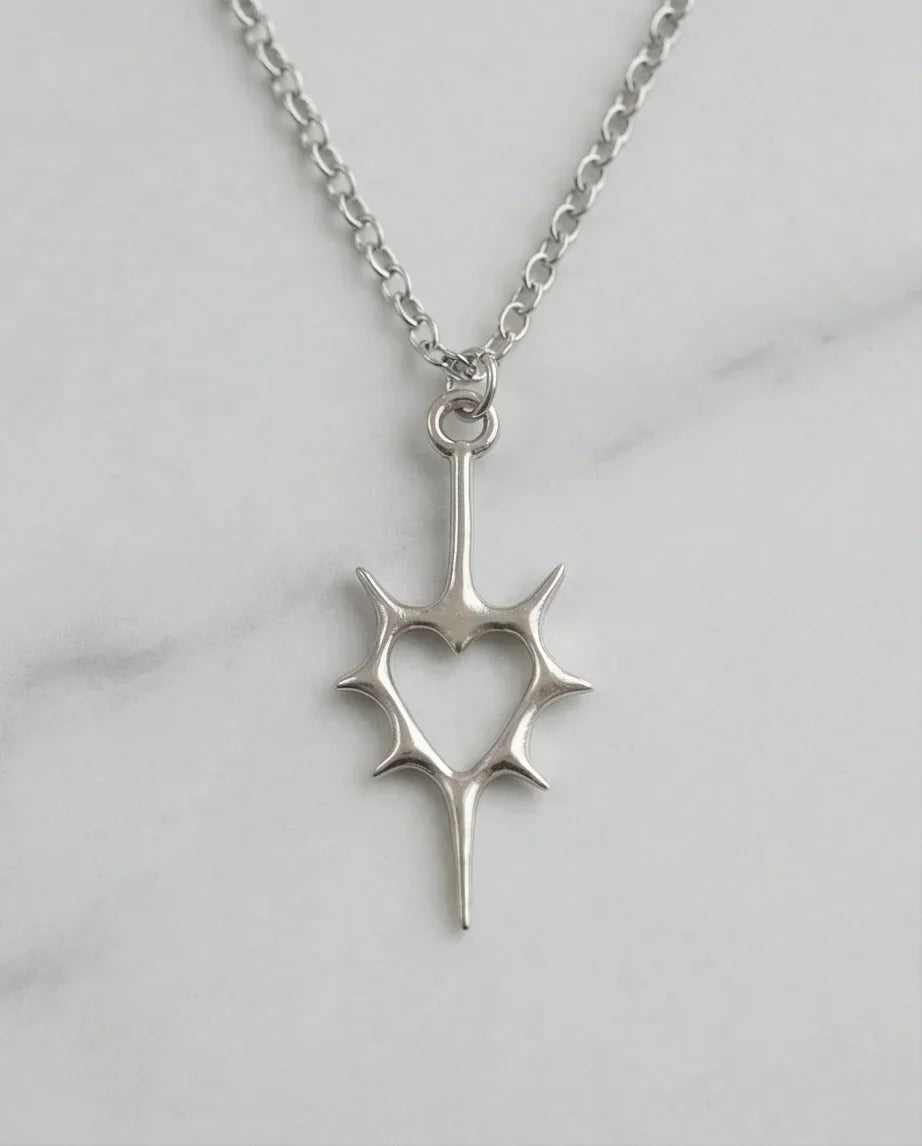 The Thorned Aura: Spiky Heart Statement Necklace