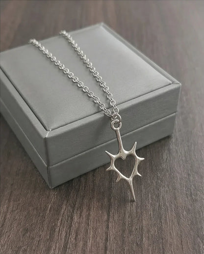 The Thorned Aura: Spiky Heart Statement Necklace