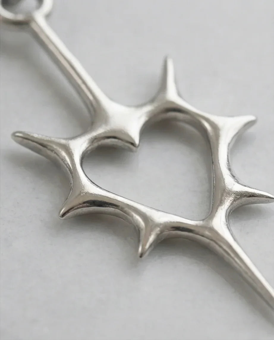 The Thorned Aura: Spiky Heart Statement Necklace