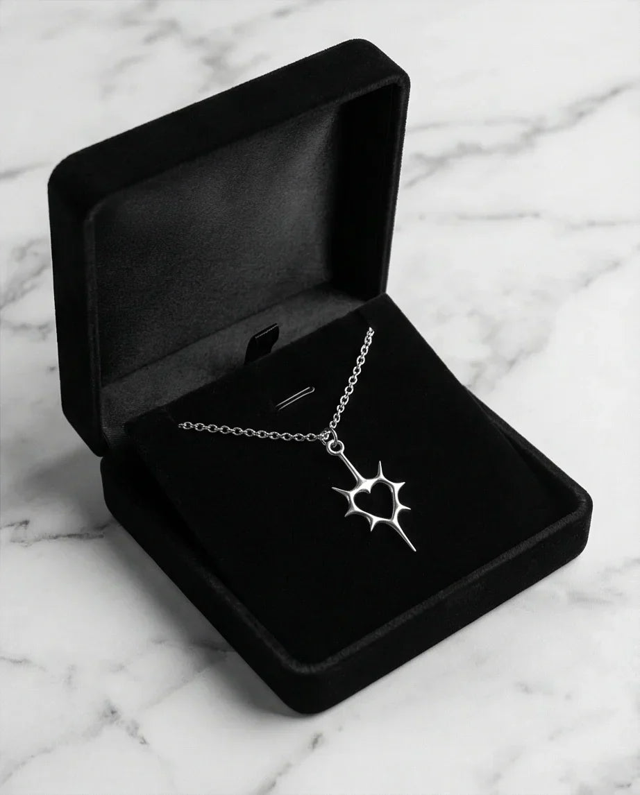 The Thorned Aura: Spiky Heart Statement Necklace