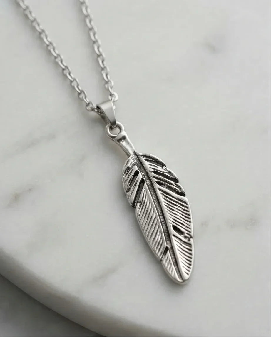 The Guardian Plume: Detailed Antique Silver Feather Necklace