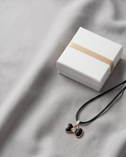 Gold Crystal and Black Bow Necklace