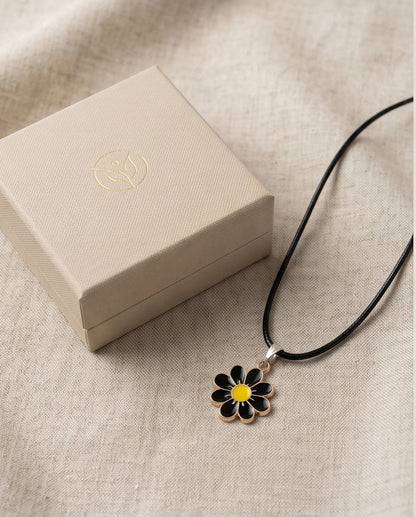 Gold and Black Daisy Pendant Necklace
