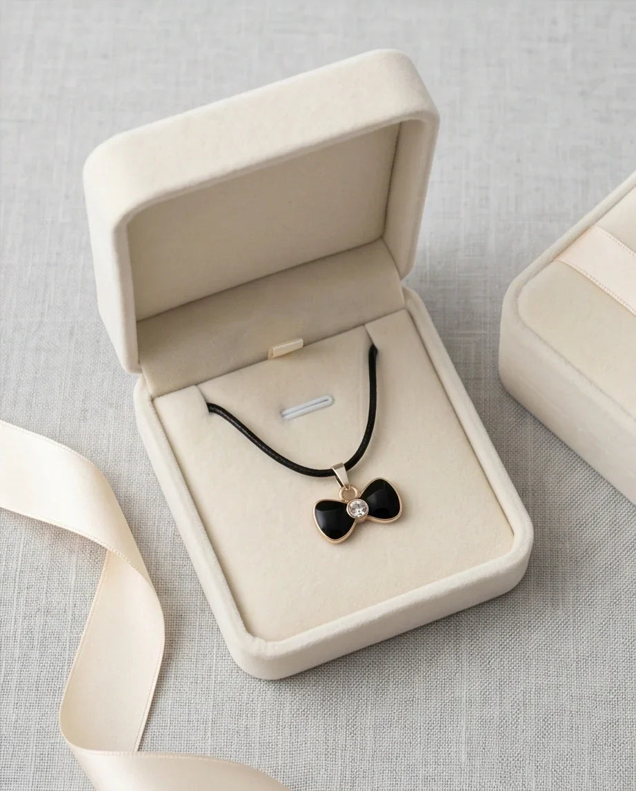 Gold Crystal and Black Bow Necklace