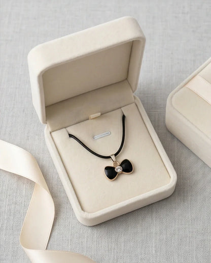 Gold Crystal and Black Bow Necklace