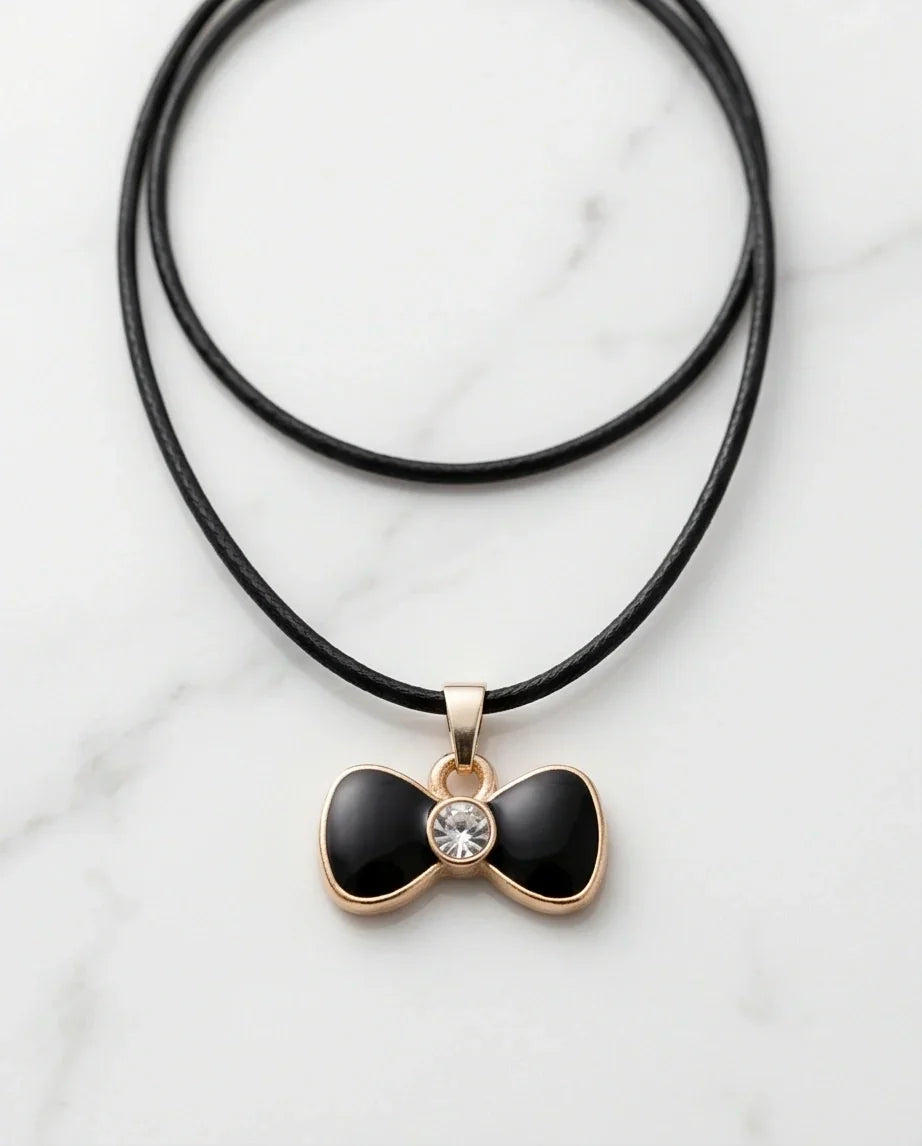 Gold Crystal and Black Bow Necklace