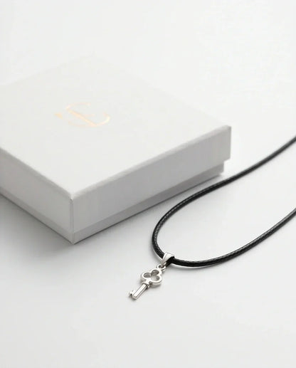 The Secret Keeper: Minimalist Silver Clover Key Pendant Necklace
