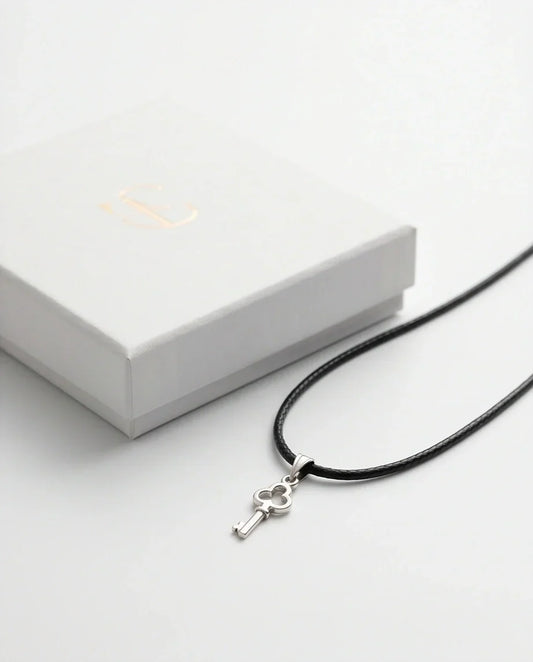 The Secret Keeper: Minimalist Silver Clover Key Pendant Necklace