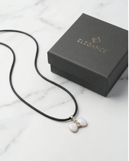Gold and White Bow Tie Pendant Necklace