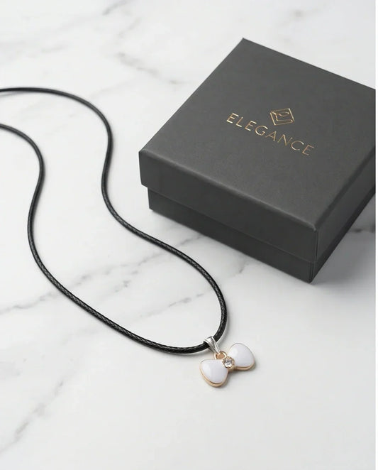 Gold and White Bow Tie Pendant Necklace