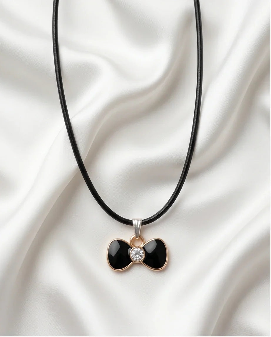 Gold Crystal and Black Bow Necklace