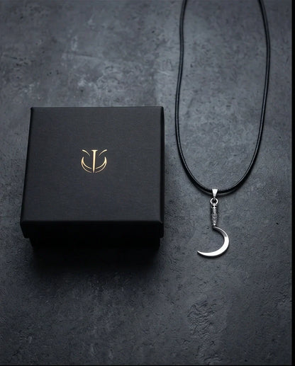 The Reaper's Crescent: Gothic Skull Sickle Pendant Necklace