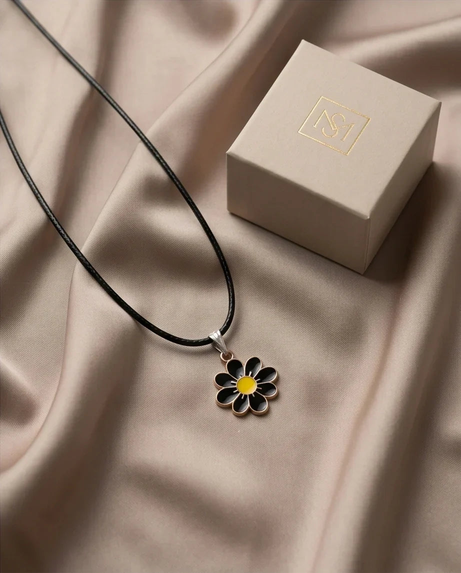 Gold and Black Daisy Pendant Necklace