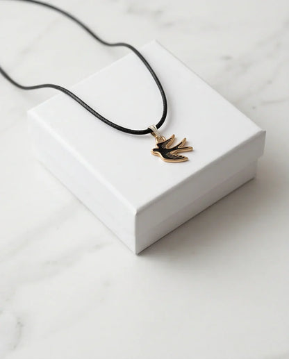 Gold and Black Soaring Swallow Necklace