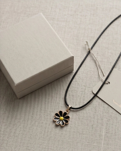 Gold and Black Daisy Pendant Necklace
