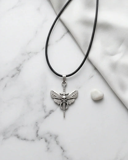 The Shadow Wing: Gothic Skull Moth Dagger Pendant Necklace