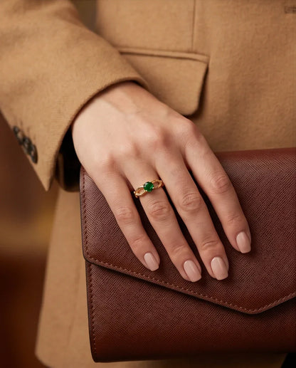Gold Emerald Round Infinity Twist Ring