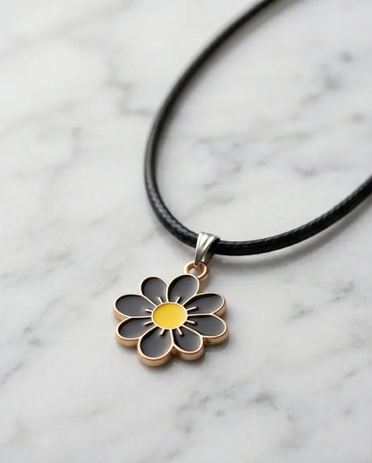 Gold and Black Daisy Pendant Necklace