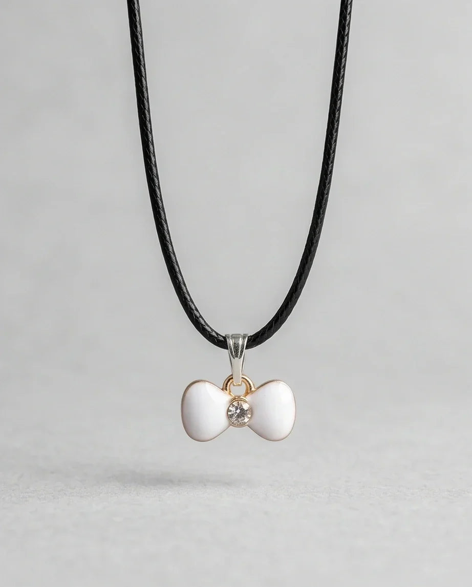 Gold and White Bow Tie Pendant Necklace