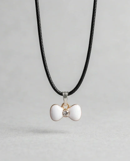 Gold and White Bow Tie Pendant Necklace