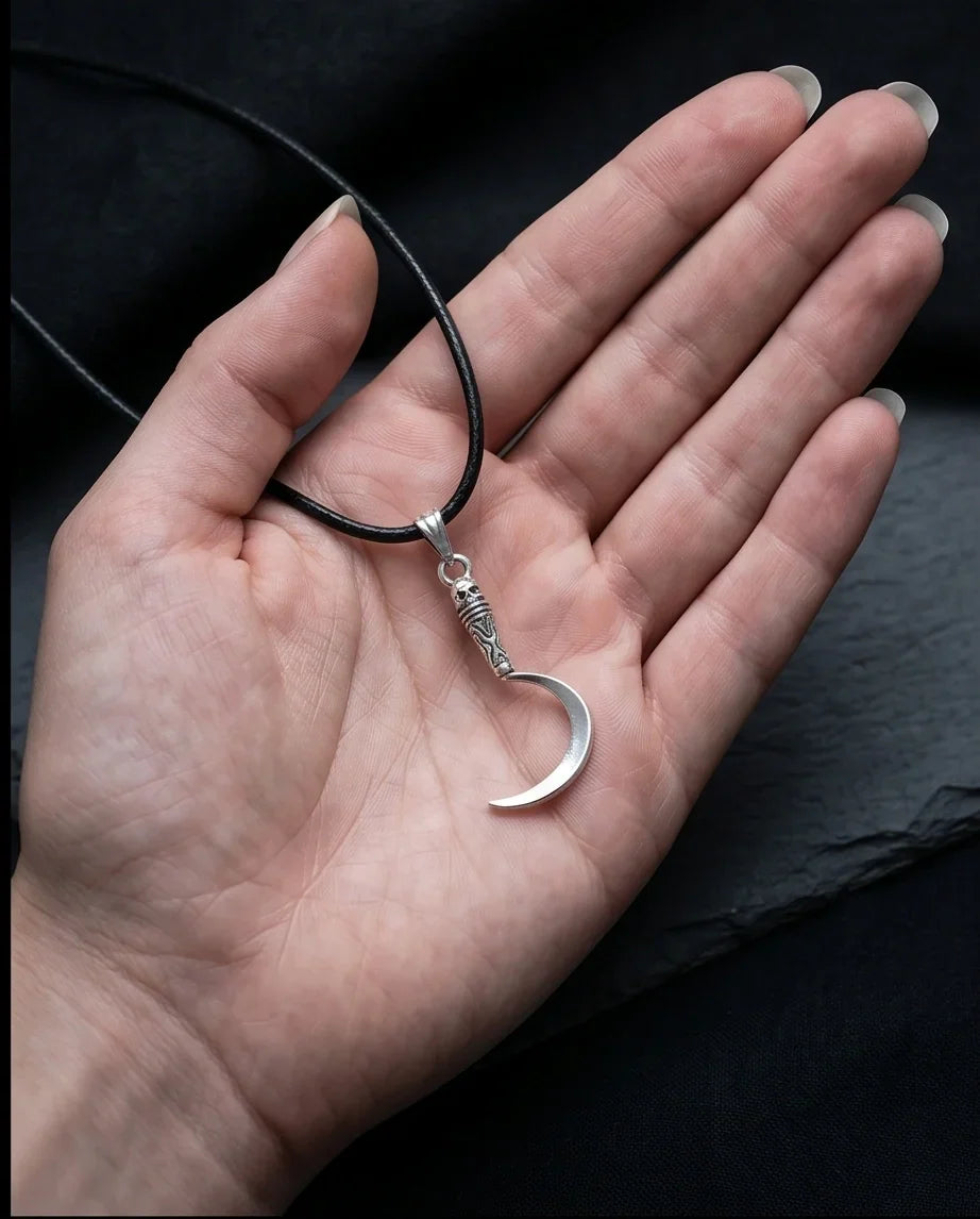 The Reaper's Crescent: Gothic Skull Sickle Pendant Necklace